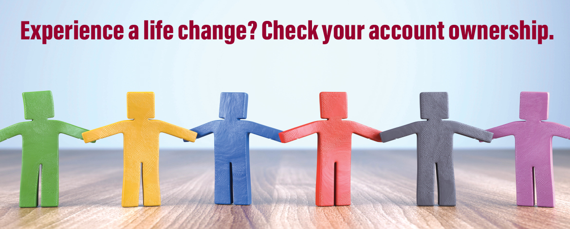 Paper-style figures holding hands on a wooden surface with the message: "Experience a life change? Check your account ownership."