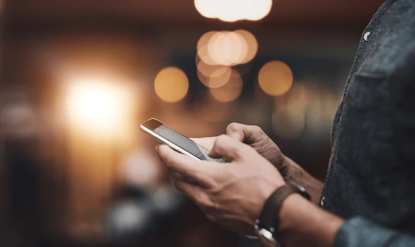 A man holding a mobile phone